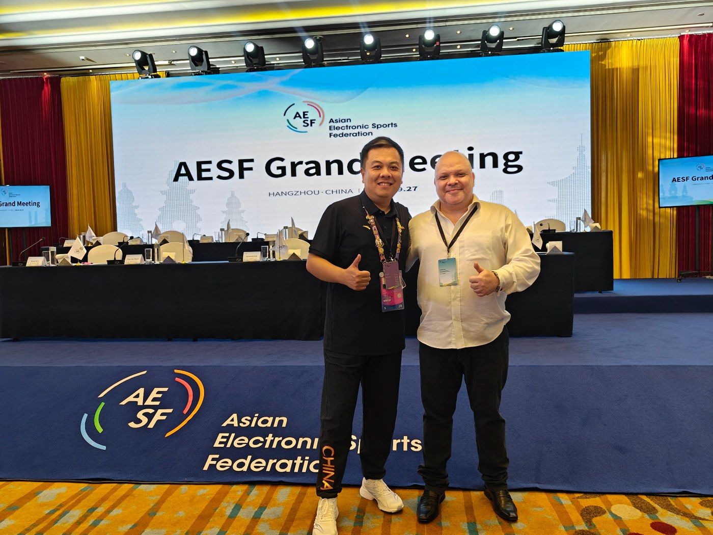 Daniel Cossi with an AESF official at the AESF Grand Meeting
